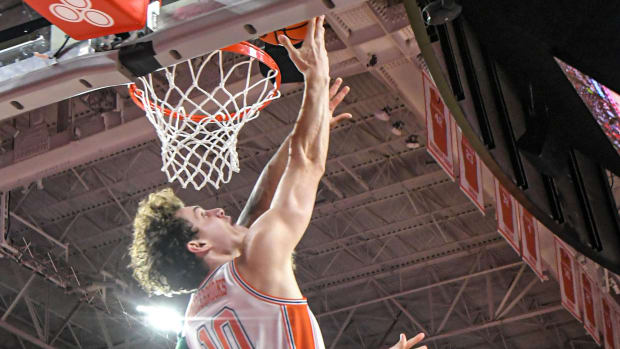 Feb 4, 2023; Clemson, South Carolina, USA; Clemson sophomore forward Ben Middlebrooks (10) misses a shot near Miami guard Isaiah Wong (2) during the second half at Littlejohn Coliseum in Clemson, S.C. Saturday, Feb. 4, 2023. Mandatory Credit: Ken Ruinard-USA TODAY Sports